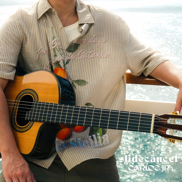 Capa do single SLIDECANCEL, de Carlos Jr.